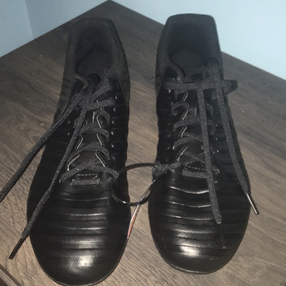 Nike all black cleats never been used brand new